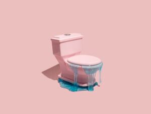 pink toilet leaking water